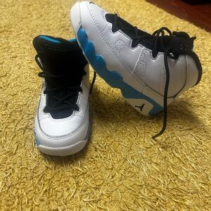 Jordan 9s. White , black and white.